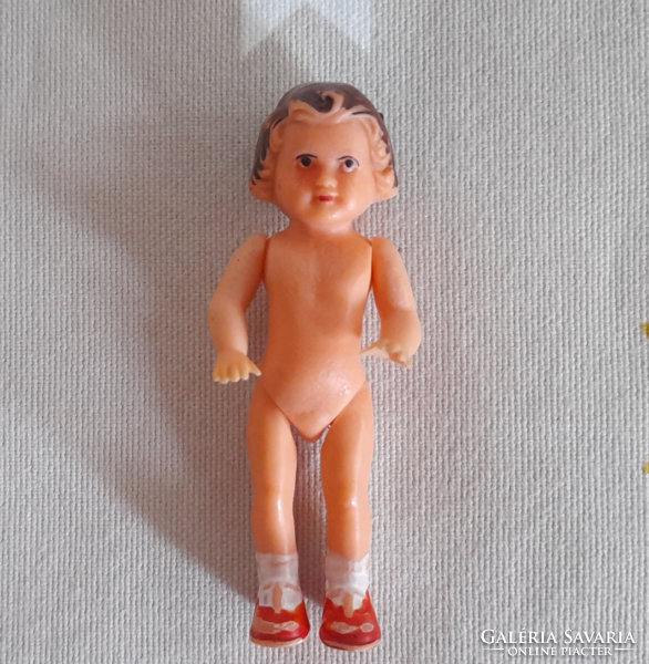 Retro dollhouse rubber doll