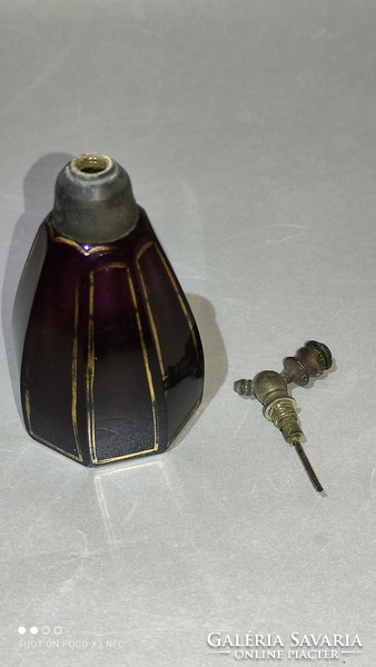 Do you wash an antique perfume bottle with a pewter attachment?
