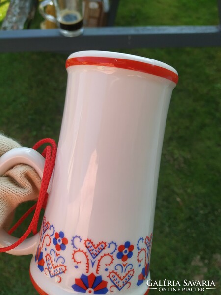 Hollóházi porcelain jug with a folk design is for sale for 