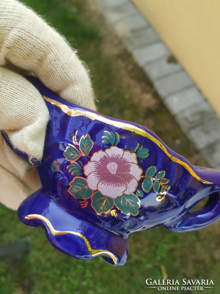 Porcelain, floral, jug, saucer for sale on a blue background!