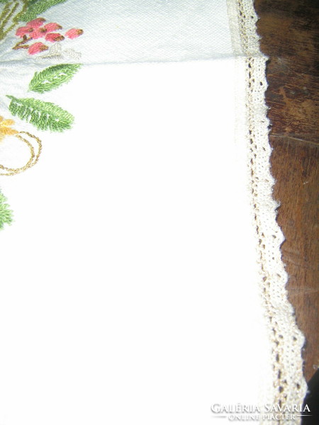 A wonderful antique Christmas hand-embroidered lace-edged woven tablecloth