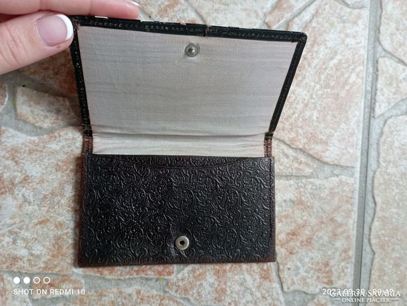 Old filigree, embossed leather file holder
