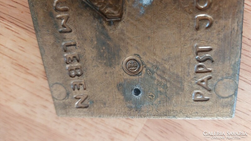(K) bronze relief marked