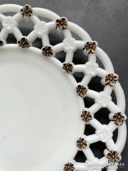Milk glass plate decorated with really showy golden flowers on a brilliant snow-white background with an openwork edge