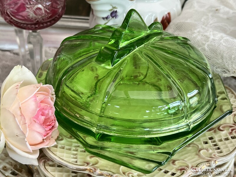 A wonderful antique cast glass butter dish