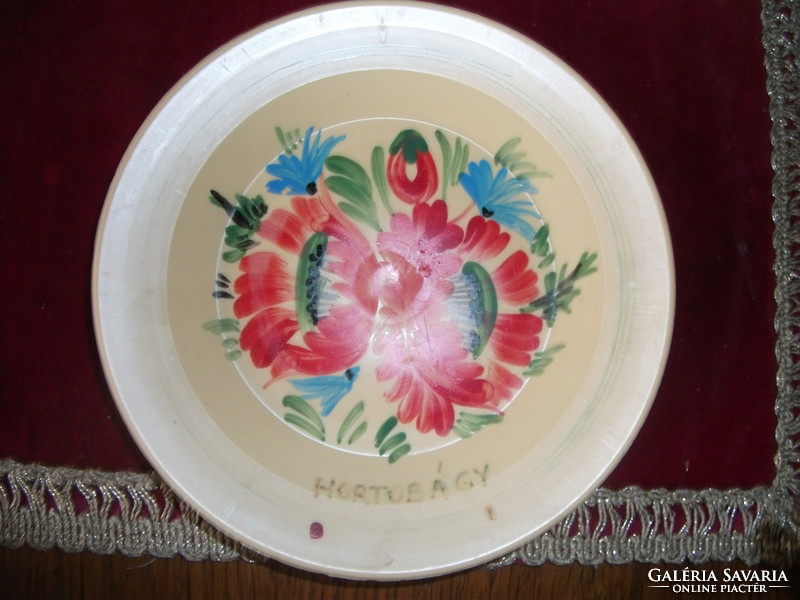 2 small plastic plates bought at the 50-year-old Hortobágy bridge fair, can be hung on the wall, unused