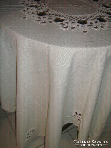 Dreamy handmade crochet flower insert in cream color on huge festive tablecloth