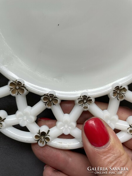Milk glass plate decorated with really showy golden flowers on a brilliant snow-white background with an openwork edge