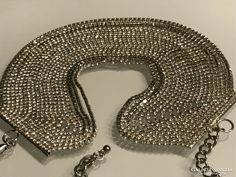 Wide rhinestone bracelet made of twenty small, shiny chains, 24 cm long
