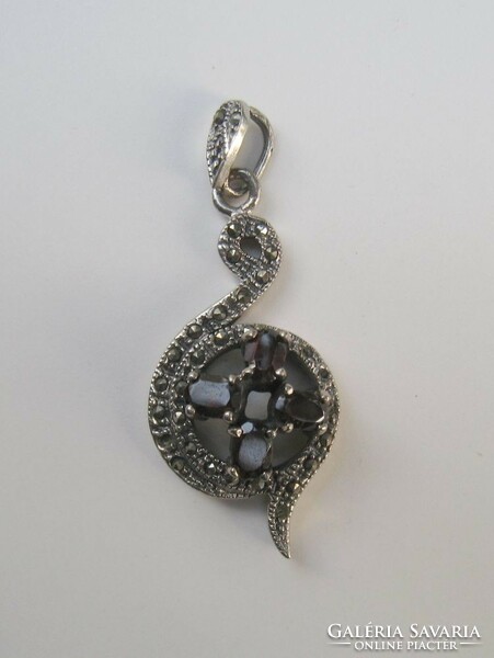 Large silver pendant with garnet stones