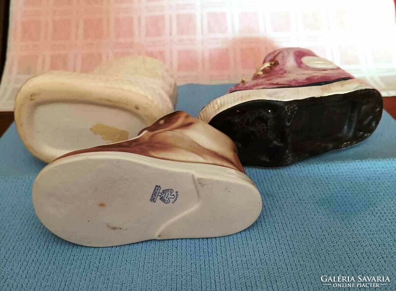 I am selling 3 small ceramic shoes
