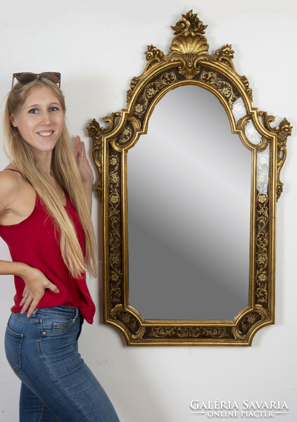 Gilded carved wood framed mirror with shell decor