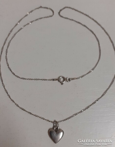 Old beautiful condition marked silver necklace with small heart pendant on it