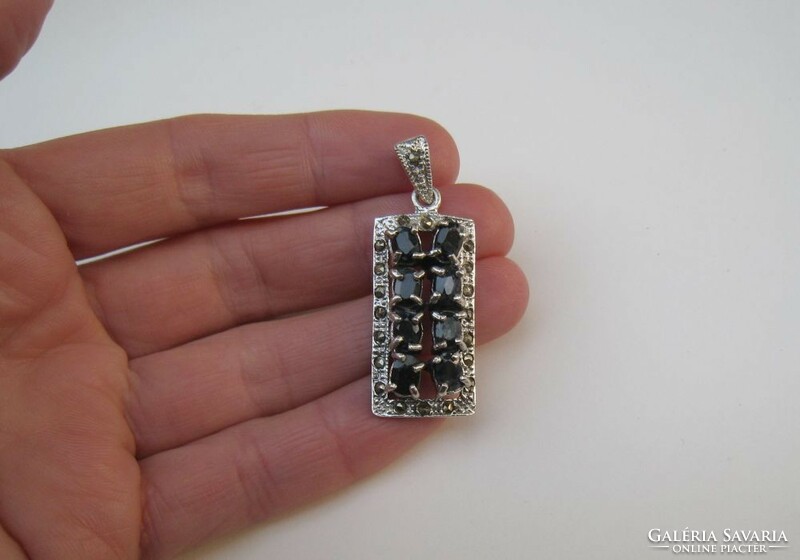 Silver pendant with many natural sapphires