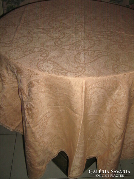 Beautiful golden yellow floral woven damask tablecloth with a lace edge