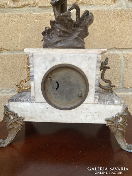 Antique female-shaped fireplace clock with a marble case