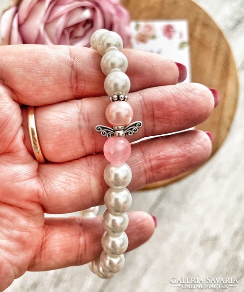 A pearl bracelet is the best for a kindergarten teacher-angel