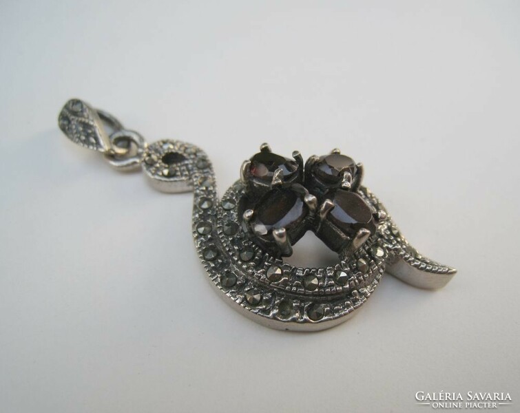 Large silver pendant with garnet stones