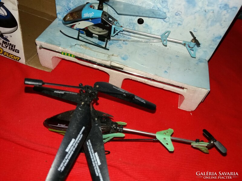 Model helicopters with 2 pieces in one with remote control box according to untested images