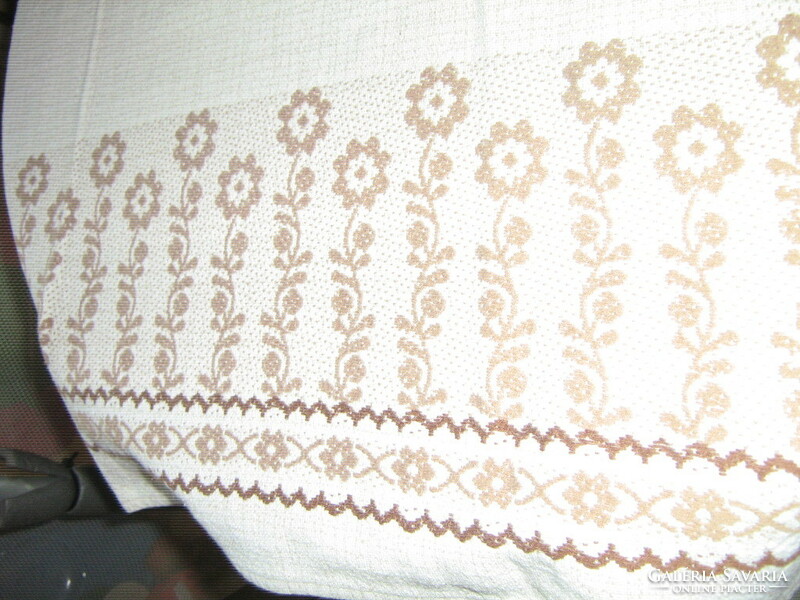 Beautiful vintage floral burst on white light brown woven tablecloth