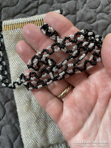 A neck phone case made with pearl weaving, a glasses holder, a small trinket