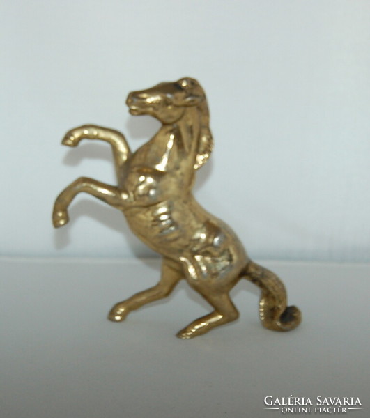 Copper statue of a climbing horse