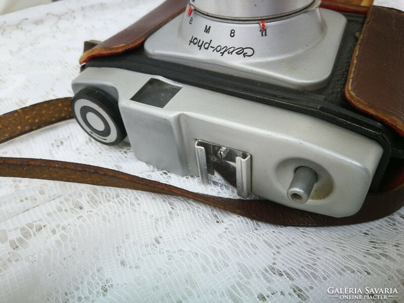 Old camera in leather case