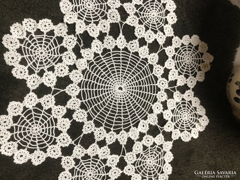 Circular crocheted lace needlework, tablecloth.