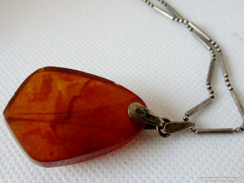 Beautiful antique Russian carved amber silver pendant on a long silver necklace