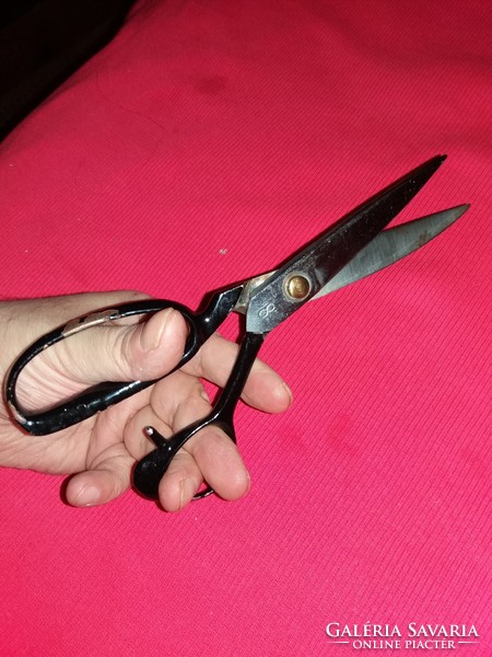 Old very sharp metal tailor's scissors as shown in the pictures
