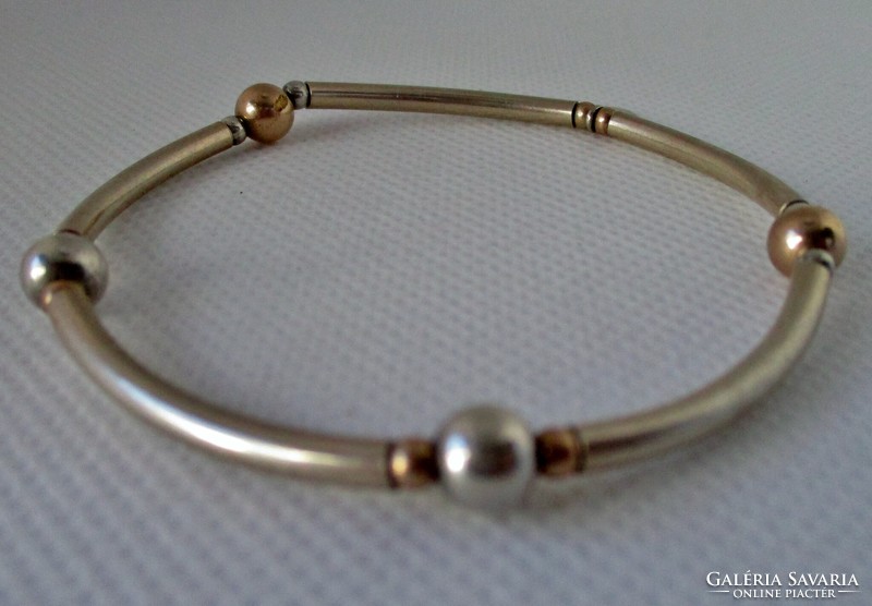 Special silver bracelet with gold-plated parts