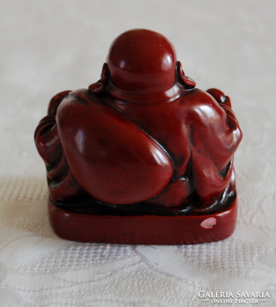 Buddha statue made of red resin