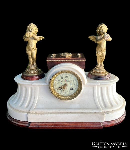 Marble fireplace clock with angel sculpture