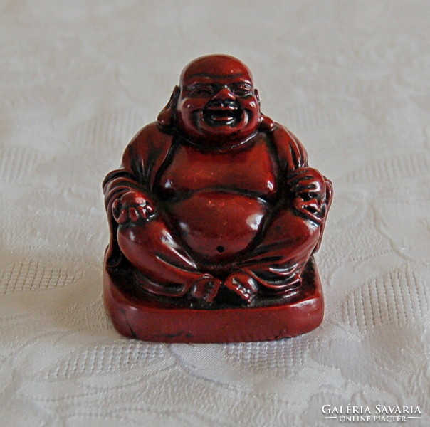 Buddha statue made of red resin