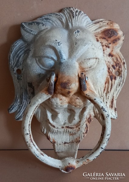 Antique lion head iron door knocker negotiable.