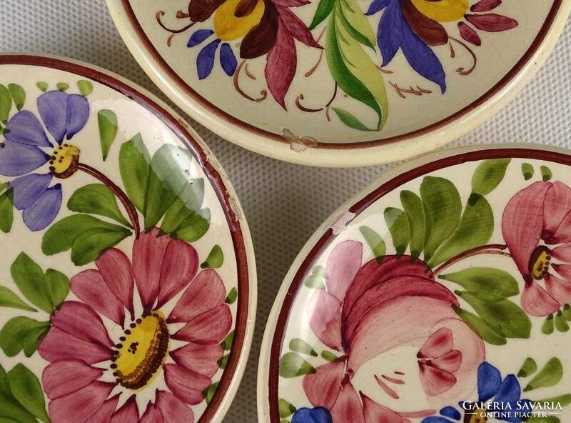 József ceramic wall plate with floral pattern marked 1O852 7 pieces