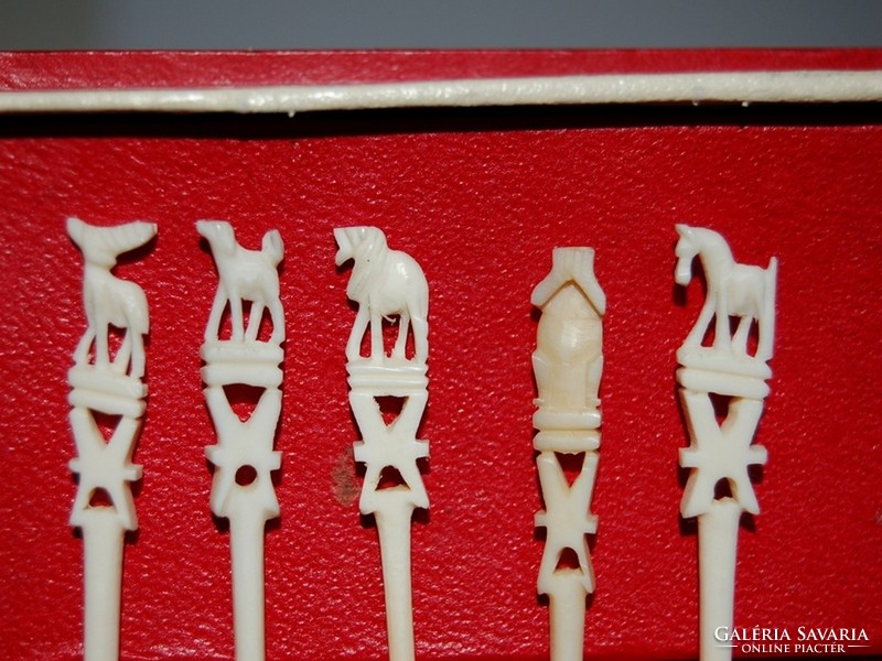 Set of 10 carved bone cocktail sticks