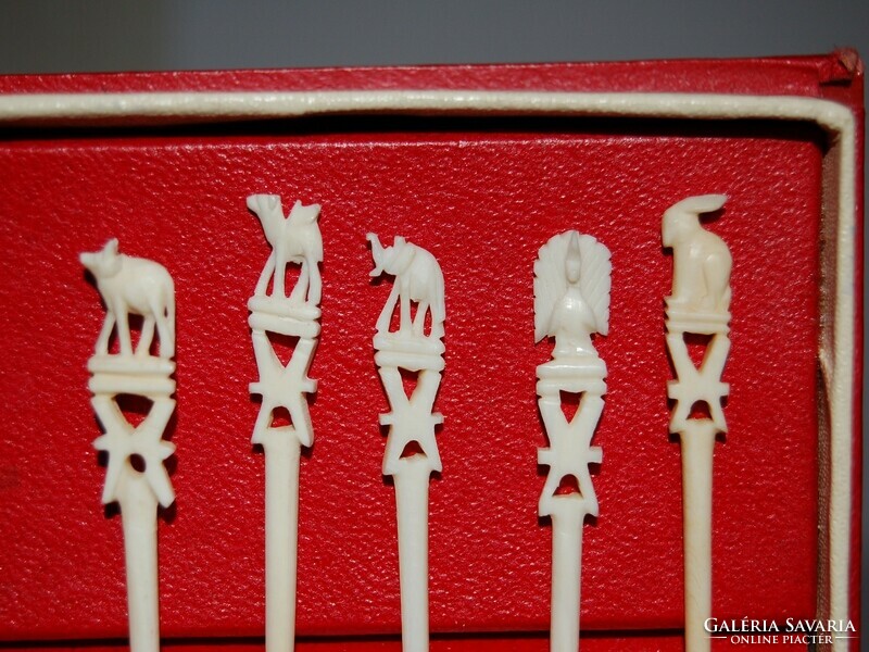 Set of 10 carved bone cocktail sticks