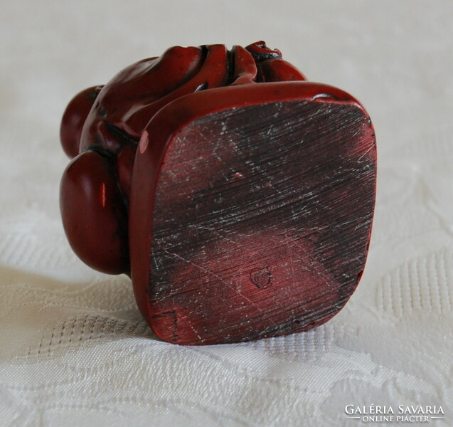 Buddha statue made of red resin