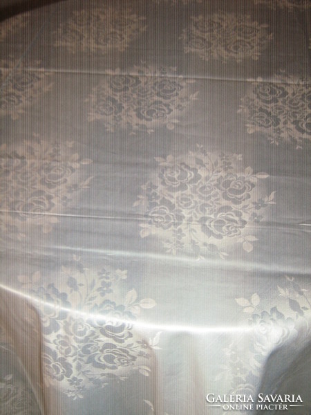 Beautiful vintage damask tablecloth with light blue rose pattern