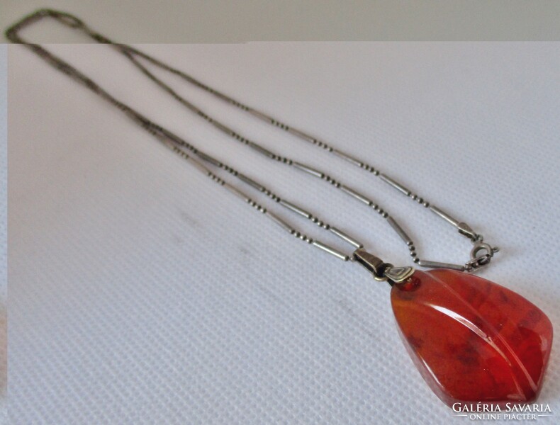 Beautiful antique Russian carved amber silver pendant on a long silver necklace