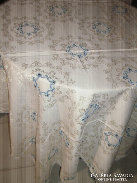 Beautiful hand-embroidered butter-colored damask tablecloth
