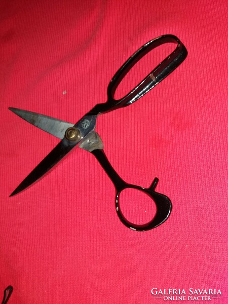 Old very sharp metal tailor's scissors as shown in the pictures