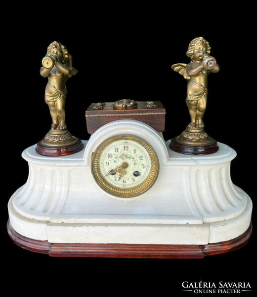 Marble fireplace clock with angel sculpture