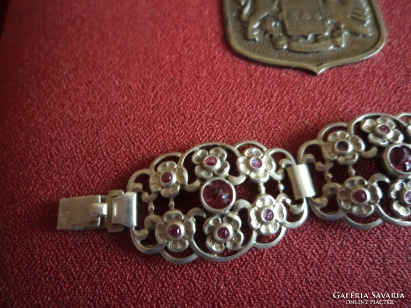 Beautiful gold-plated bracelet_ with small burgundy stones