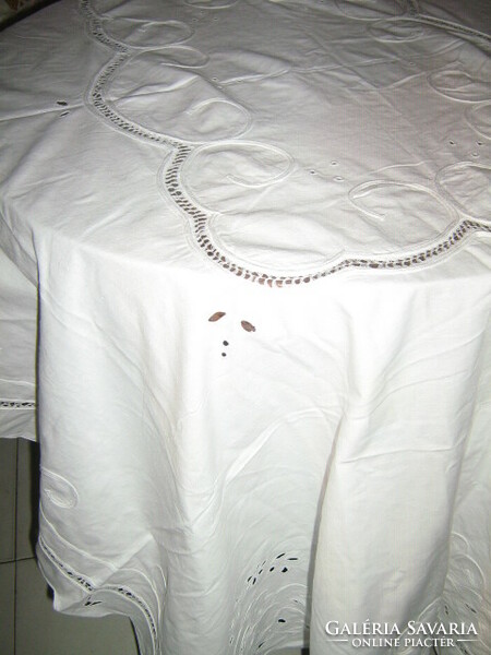 Beautiful ribbon embroidered on special white lace tablecloth