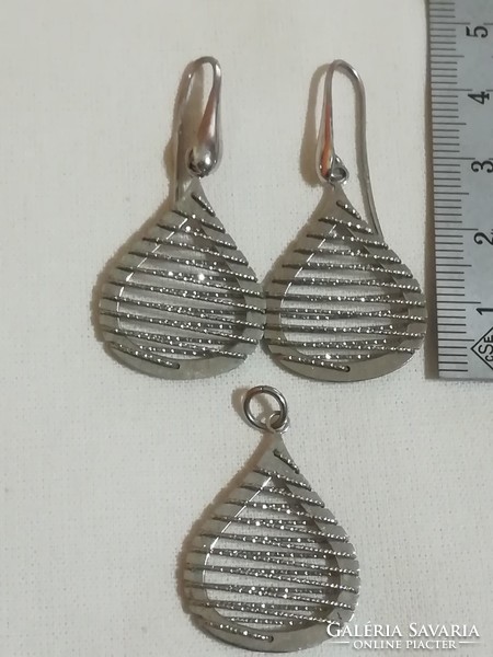 Beautiful handcrafted silver earrings with a pair of pendants.