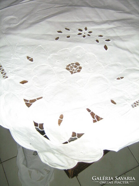 Beautiful ribbon embroidered on special white lace tablecloth