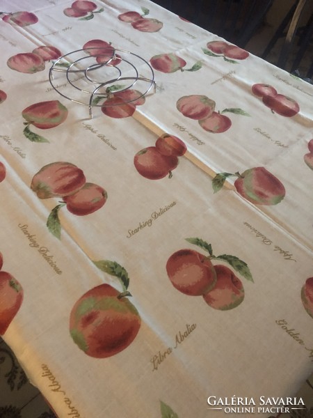 Apples on the table. Cheerful summer and autumn tablecloth, tablecloth.