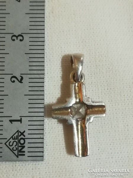 Silver crucifix pendant.